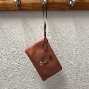 Coach Snoopy wristlet